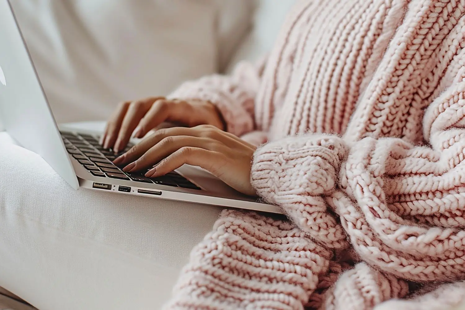 a close up of a woman hand working on a computer